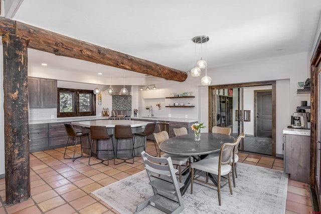 156 Zeligman St, Crested Butte, CO 81224 - dining area with light tile patterned floors, beam ceiling, and recessed lighting