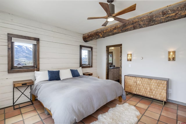 156 Zeligman St, Crested Butte, CO 81224 - bedroom featuring tile patterned floors, wood walls, and beamed ceiling