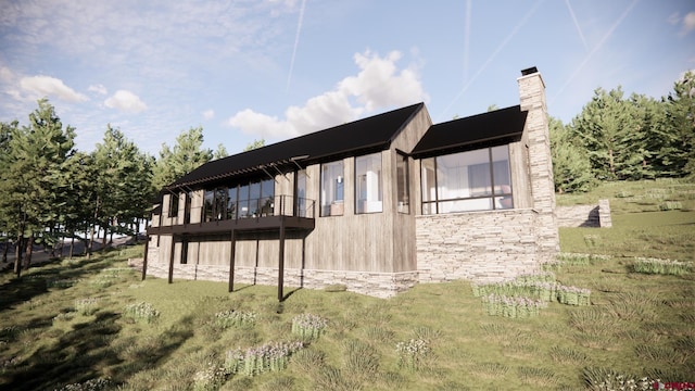 1620 Red Mountain Ranch Rd, Crested Butte, CO 81225 - view of home's exterior featuring stone siding, a chimney, a yard, and a balcony