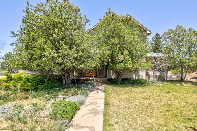 15307 Rd R, Cahone, CO 81320 - view of front facade with a front yard and a porch