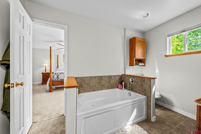 125 Ball Ln, Durango, CO 81301 - full bath with a tub with jets, baseboards, and toilet