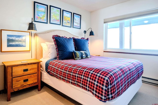 35 Emmons Rd Unit 11, Mount Crested Butte, CO 81225 - carpeted bedroom featuring baseboard heating