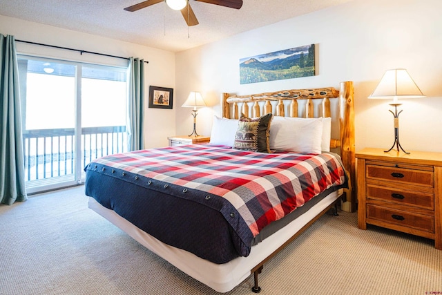 35 Emmons Rd Unit 11, Mount Crested Butte, CO 81225 - bedroom with carpet flooring, access to outside, and a ceiling fan