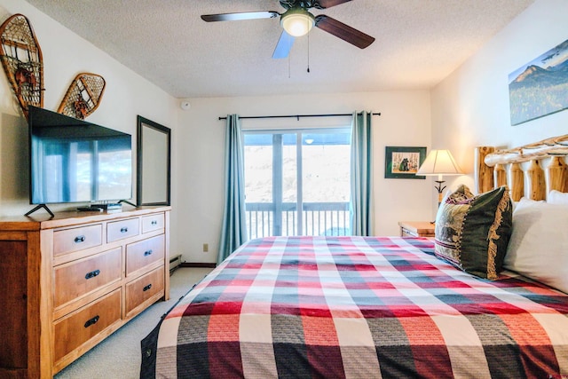 35 Emmons Rd Unit 11, Mount Crested Butte, CO 81225 - bedroom with access to outside, light colored carpet, a textured ceiling, baseboard heating, and ceiling fan