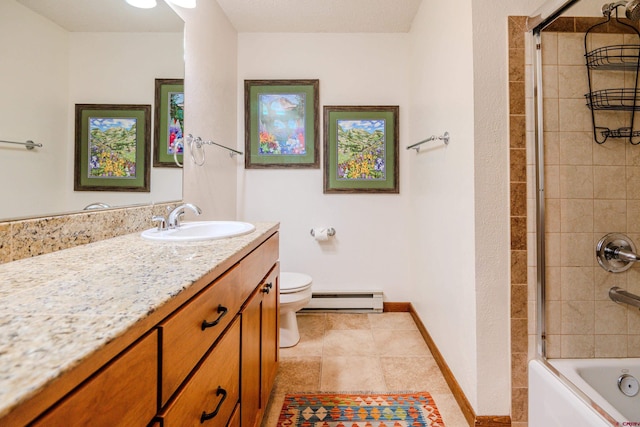 35 Emmons Rd Unit 11, Mount Crested Butte, CO 81225 - bathroom with a baseboard heating unit, toilet, vanity, baseboards, and washtub / shower combination