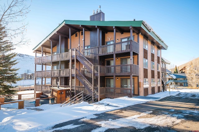 35 Emmons Rd Unit 11, Mount Crested Butte, CO 81225 - snow covered property with stairway