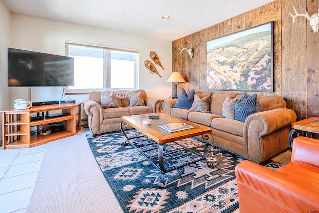 35 Emmons Rd Unit 11, Mount Crested Butte, CO 81225 - living area featuring a textured ceiling, wooden walls, and a baseboard heating unit
