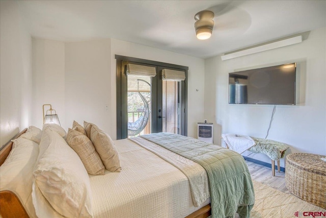 190 Luxury Pl Unit 3, Pagosa Springs, CO 81147 - bedroom with access to exterior, light wood finished floors, and ceiling fan