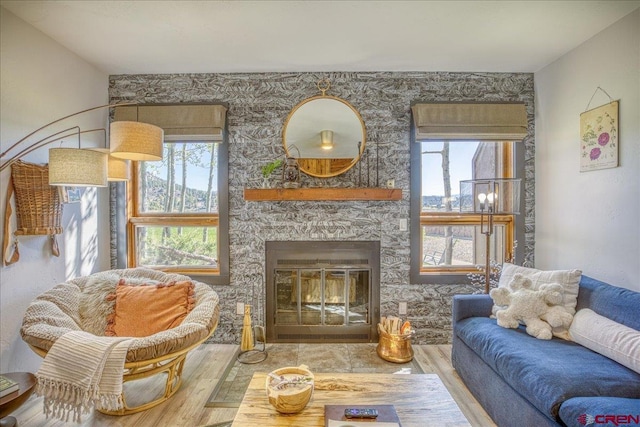 190 Luxury Pl Unit 3, Pagosa Springs, CO 81147 - living area with wood finished floors and a fireplace