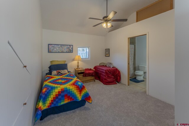 310 Second St, Crested Butte, CO 81224 - carpeted bedroom featuring vaulted ceiling, connected bathroom, and a ceiling fan
