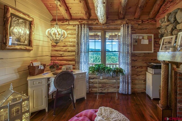 598 Blue Jay Cir, Pagosa Springs, CO 81147 - office space featuring wooden ceiling with exposed beams, rustic walls, a chandelier, and dark wood-style floors