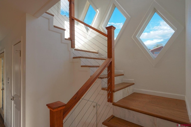 511 E Garland St, La Veta, CO 81055 - staircase with baseboards and wood finished floors