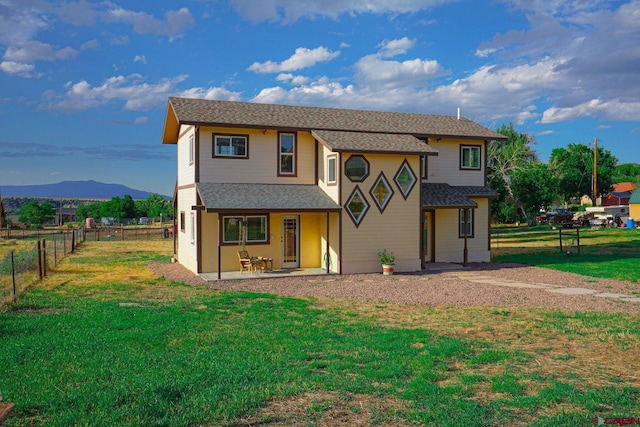 511 E Garland St, La Veta, CO 81055 - view of front of house with a mountain view and roof with shingles