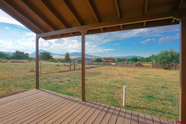 511 E Garland St, La Veta, CO 81055 - wooden terrace featuring a mountain view and a view of rural / pastoral area