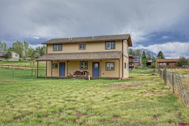 511 E Garland St, La Veta, CO 81055 - rear view of property featuring a porch and a shingled roof