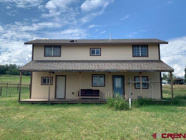511 E Garland St, La Veta, CO 81055 - view of front of property featuring a porch