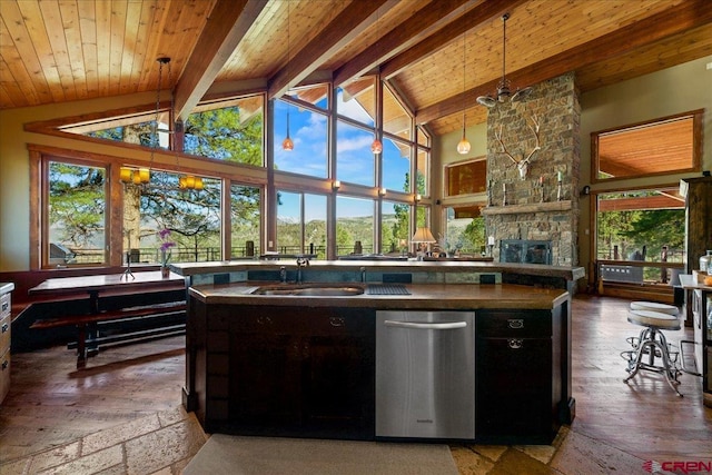 178 Valley View Rd, Ridgway, CO 81432 - kitchen with a sink, dark countertops, decorative light fixtures, hardwood / wood-style floors, and high vaulted ceiling