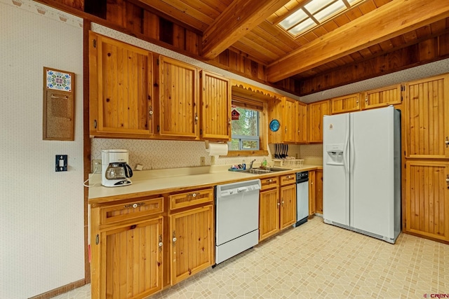 953 Mushroom Ln, Bayfield, CO 81122 - kitchen featuring white appliances, wooden ceiling with exposed beams, light countertops, light floors, and wallpapered walls