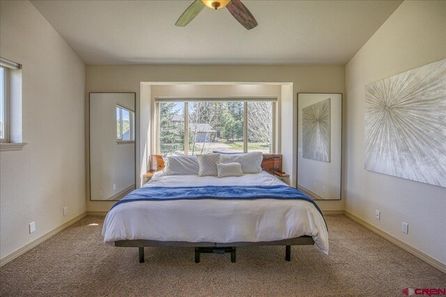 49 Sugarloaf Dr, Pagosa Springs, CO 81147 - bedroom with carpet flooring, a ceiling fan, and baseboards
