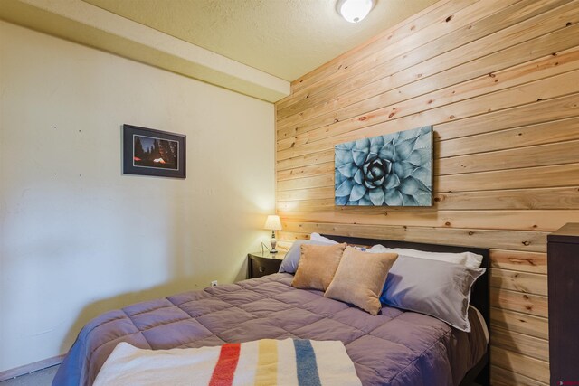 2439 County Road 359, Pagosa Springs, CO 81147 - bedroom with wood walls