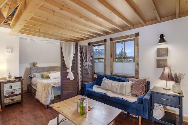 190 Teocalli Rd, Crested Butte, CO 81224 - bedroom featuring beam ceiling, dark wood-style floors, and baseboards
