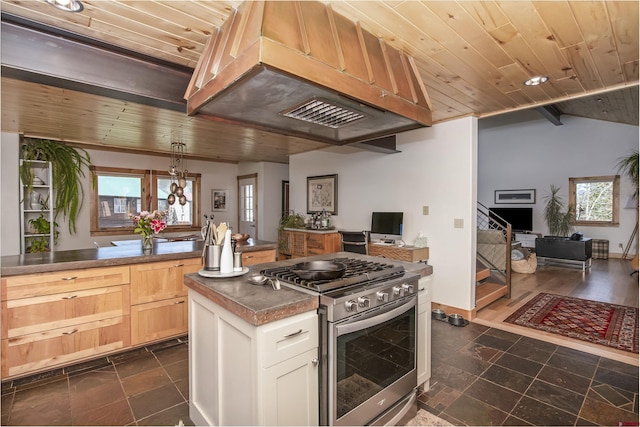 190 Teocalli Rd, Crested Butte, CO 81224 - kitchen featuring stainless steel range with gas cooktop, wooden ceiling, range hood, dark countertops, and lofted ceiling