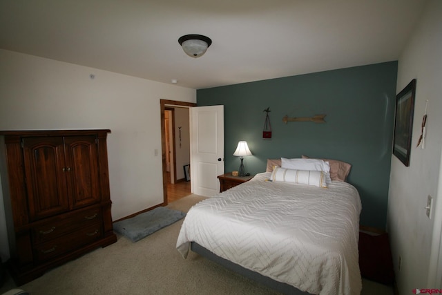 540 Redcliff Cir # E-104, Ridgway, CO 81432 - bedroom with light carpet and baseboards