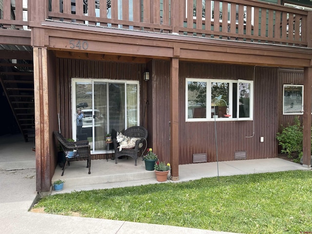 540 Redcliff Cir # E-104, Ridgway, CO 81432 - view of exterior entry featuring crawl space and a balcony