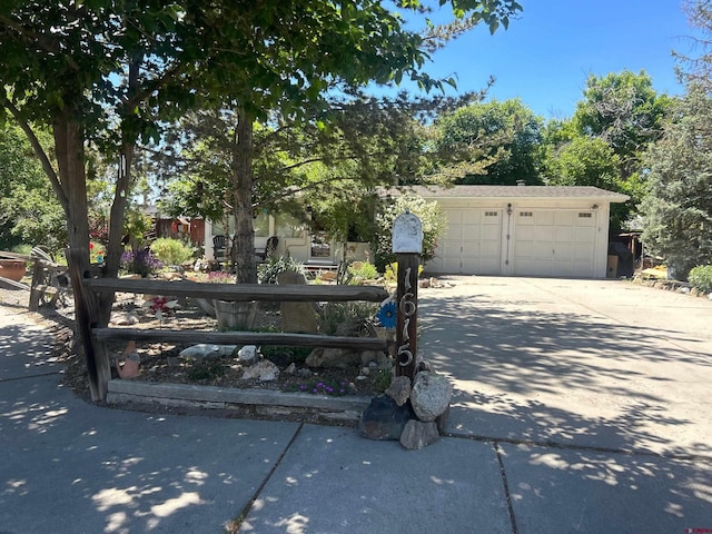 1615 Maple Ct, Grand Junction, CO 81505 - obstructed view of property featuring driveway