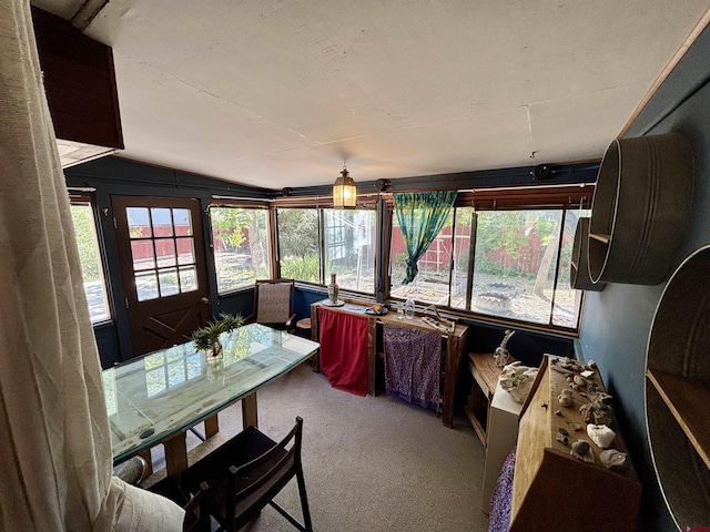 1615 Maple Ct, Grand Junction, CO 81505 - sunroom with carpet flooring, healthy amount of natural light, and vaulted ceiling