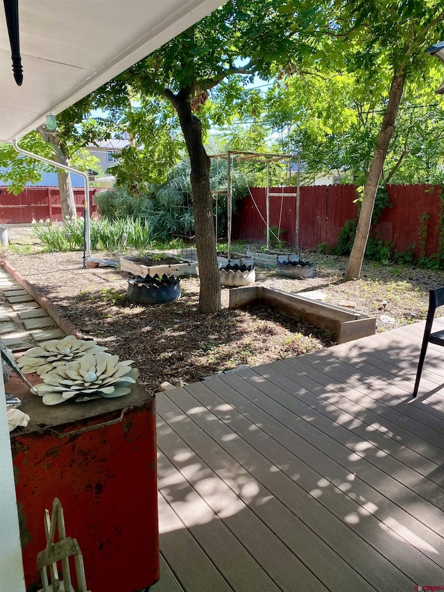 1615 Maple Ct, Grand Junction, CO 81505 - wooden terrace with a fenced backyard