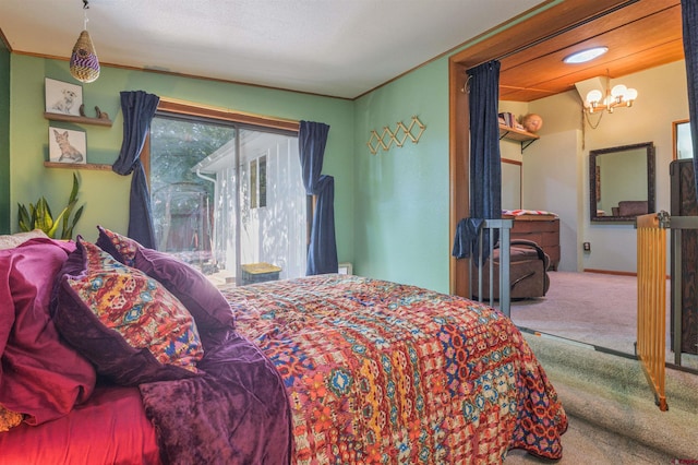 1615 Maple Ct, Grand Junction, CO 81505 - carpeted bedroom featuring a chandelier