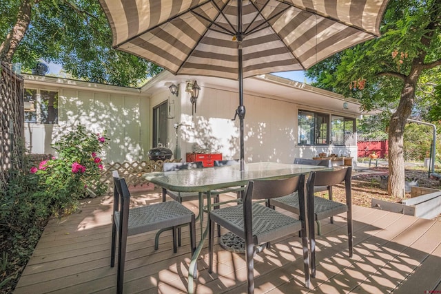 1615 Maple Ct, Grand Junction, CO 81505 - wooden deck featuring outdoor dining area