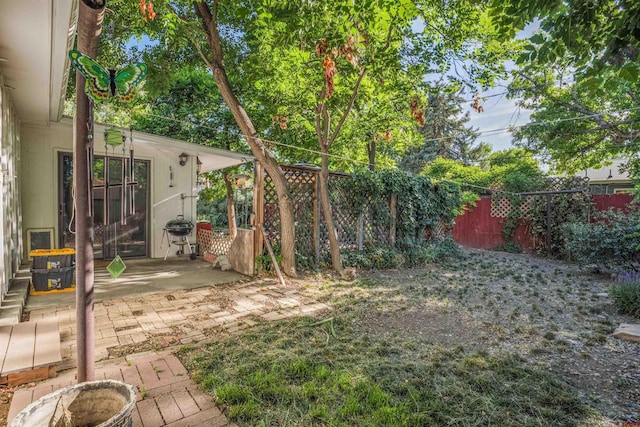 1615 Maple Ct, Grand Junction, CO 81505 - fenced backyard featuring a patio area