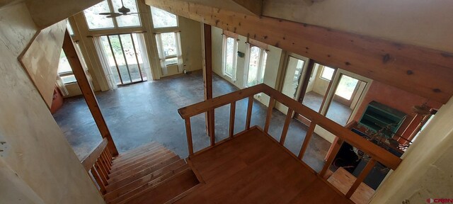 12912 3100th Rd, Hotchkiss, CO 81419 - stairway with a ceiling fan, vaulted ceiling, and concrete floors