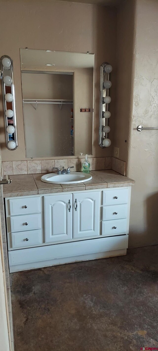 12912 3100th Rd, Hotchkiss, CO 81419 - bathroom with vanity and concrete flooring