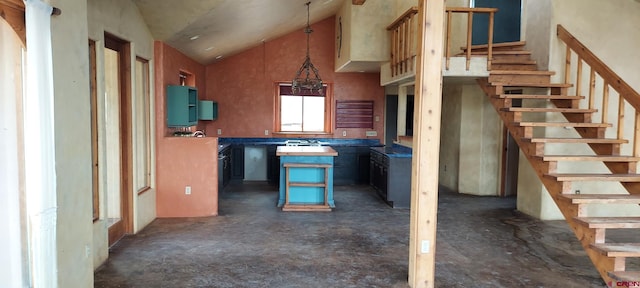 12912 3100th Rd, Hotchkiss, CO 81419 - kitchen featuring a center island, high vaulted ceiling, and pendant lighting