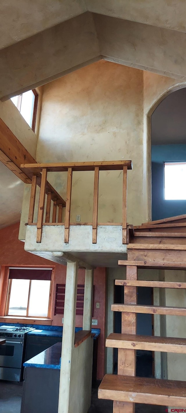 12912 3100th Rd, Hotchkiss, CO 81419 - stairs with lofted ceiling and arched walkways
