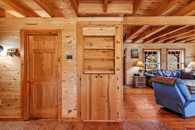 LOT7 Aspen Hills Rd, Cedaredge, CO 81413 - living room with wooden walls, wood ceiling with exposed beams, and hardwood / wood-style flooring