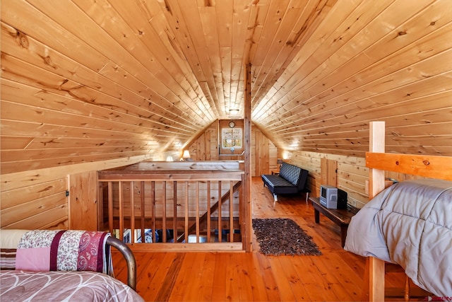 LOT7 Aspen Hills Rd, Cedaredge, CO 81413 - bedroom with wooden ceiling, wood walls, lofted ceiling, and hardwood / wood-style flooring