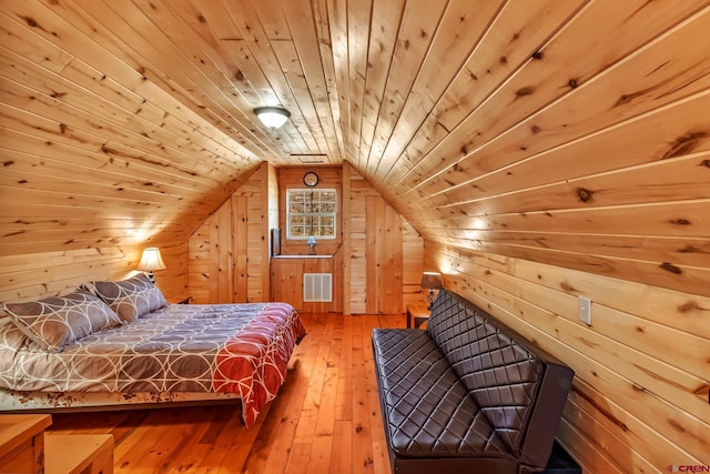 LOT7 Aspen Hills Rd, Cedaredge, CO 81413 - bedroom featuring wood walls, wood ceiling, hardwood / wood-style flooring, and vaulted ceiling
