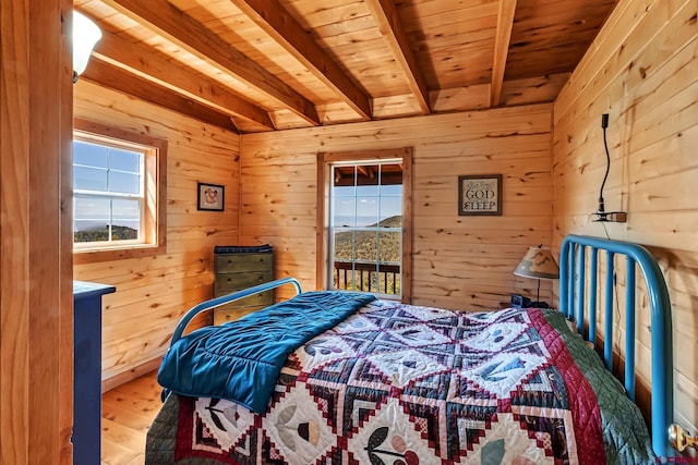 LOT7 Aspen Hills Rd, Cedaredge, CO 81413 - bedroom featuring wooden ceiling with exposed beams, hardwood / wood-style flooring, and wood walls