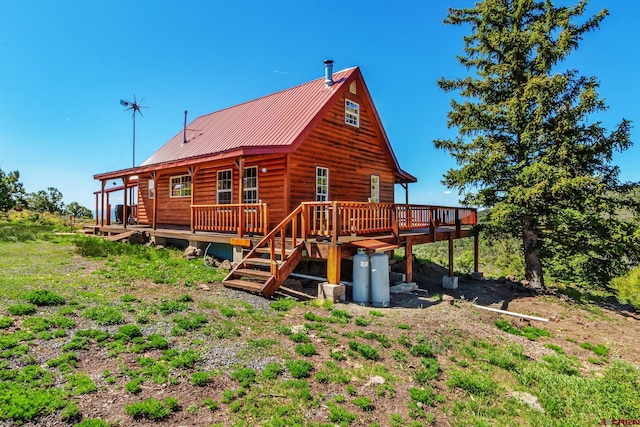 LOT7 Aspen Hills Rd, Cedaredge, CO 81413 - back of house with a wooden deck, metal roof, and faux log siding