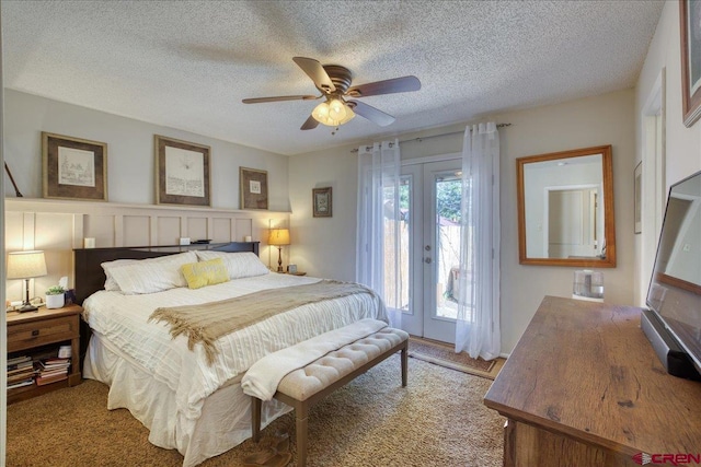 43 W Radiant Ct, Pagosa Springs, CO 81147 - bedroom featuring access to outside, french doors, a textured ceiling, and ceiling fan