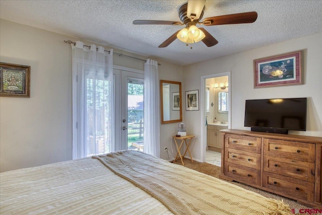 43 W Radiant Ct, Pagosa Springs, CO 81147 - bedroom featuring access to exterior, a textured ceiling, ensuite bath, light colored carpet, and a ceiling fan