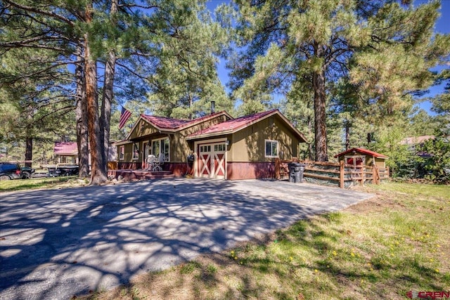 43 W Radiant Ct, Pagosa Springs, CO 81147 - rustic home featuring a deck