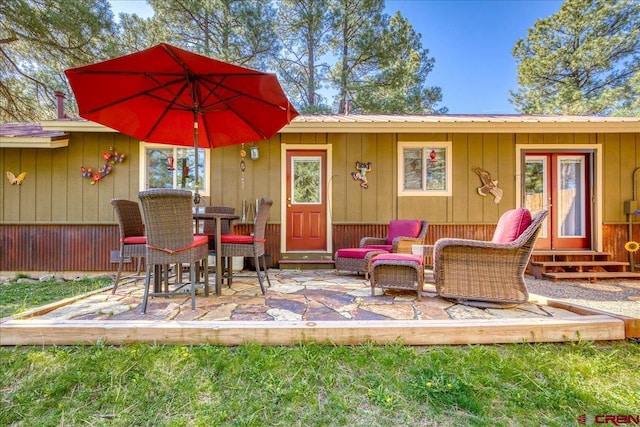 43 W Radiant Ct, Pagosa Springs, CO 81147 - wooden terrace with entry steps and a patio