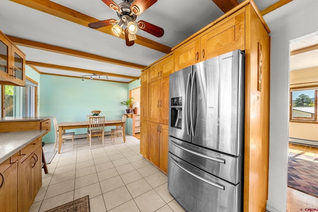 2503 Borrego Dr, Durango, CO 81301 - kitchen featuring stainless steel fridge, glass insert cabinets, ceiling fan, light tile patterned floors, and beam ceiling