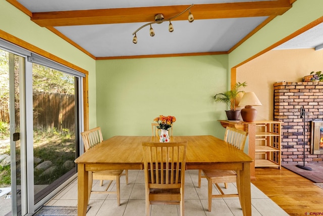 2503 Borrego Dr, Durango, CO 81301 - tiled dining area featuring crown molding