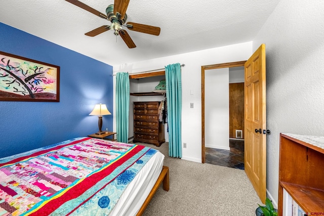 2503 Borrego Dr, Durango, CO 81301 - bedroom featuring carpet, a closet, a ceiling fan, and baseboards
